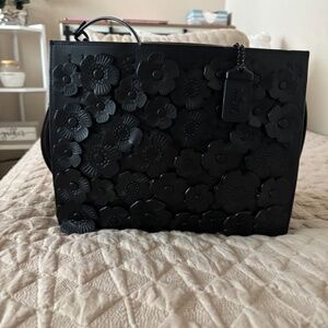 Coach Rogue Bag with Tea Rose Appliqué.